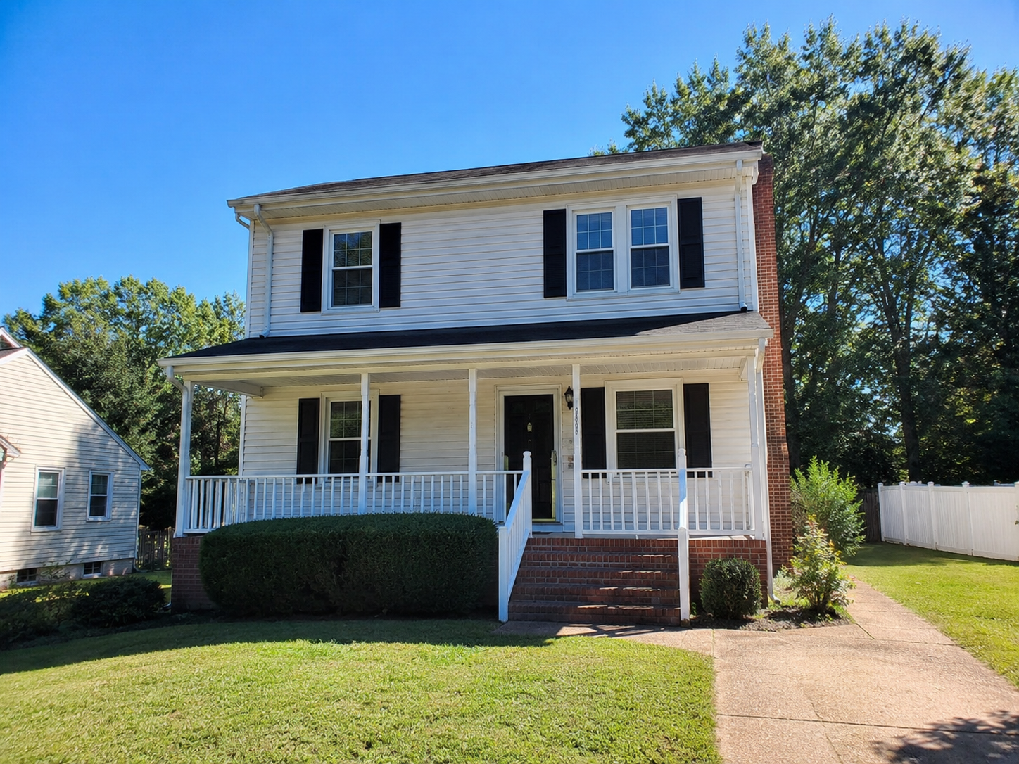 Front exterior of a two-story single-family investment property