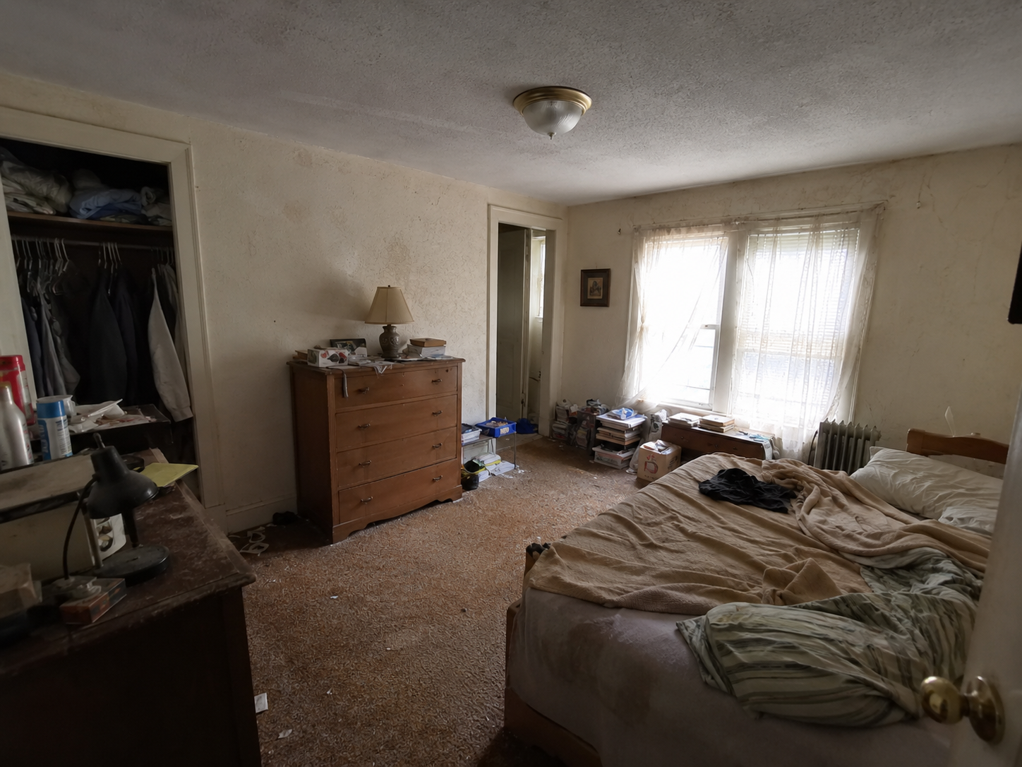 A dated bedroom before updates